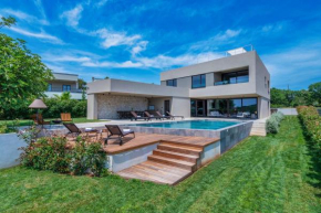 Luxury beachside villa with a pool and a sea view